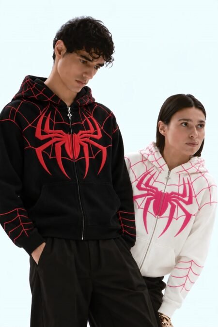 Spider-Man puff print zip hoodies in black with red print and white with pink print